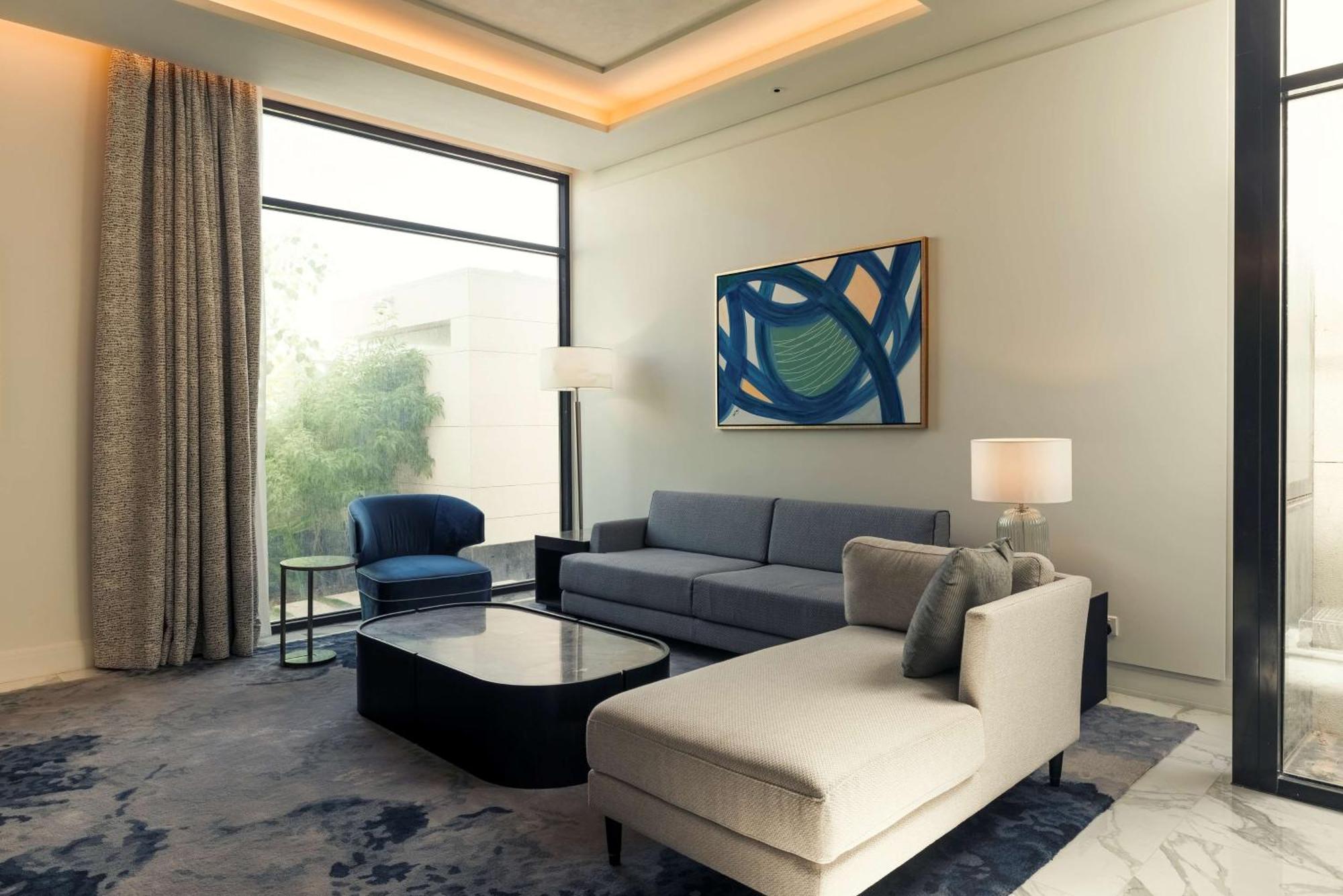 Mansard Riyadh, A Radisson Collection Hotel ภายนอก รูปภาพ A living room at the hotel